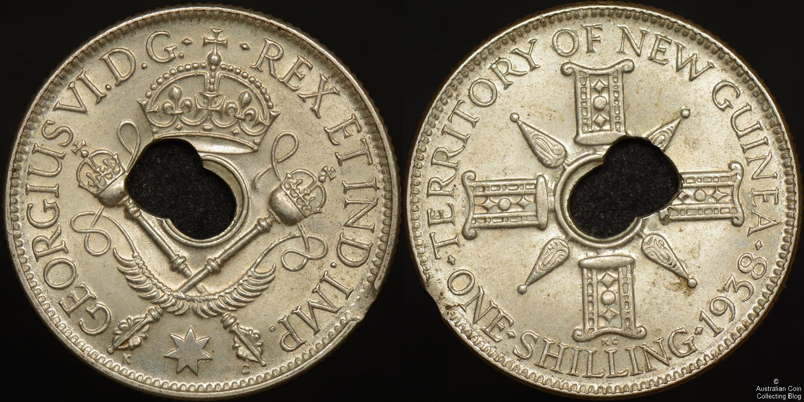 New Guinea 1938 Shilling Double Centre Hole/Off Centre Hole Error with Edge Clip